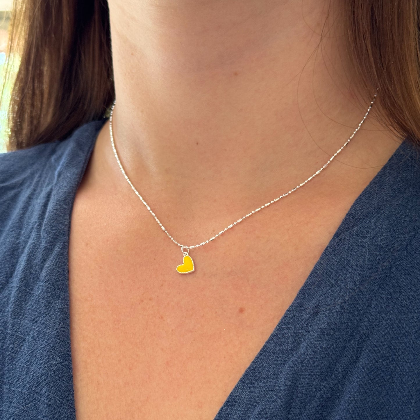 Collar corazón amarillo