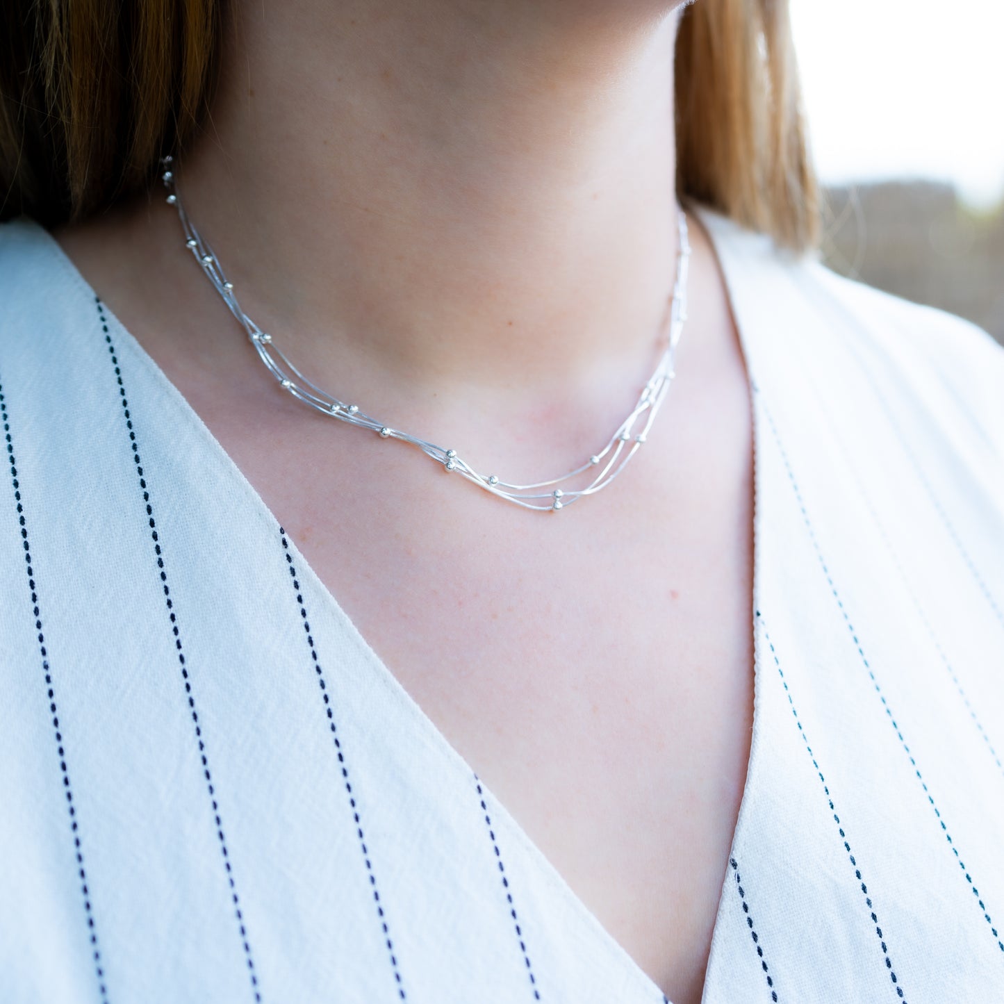 Collar triple esferas