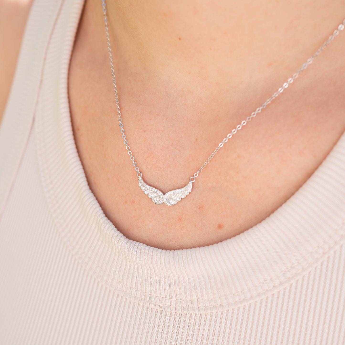 Collar alas circones