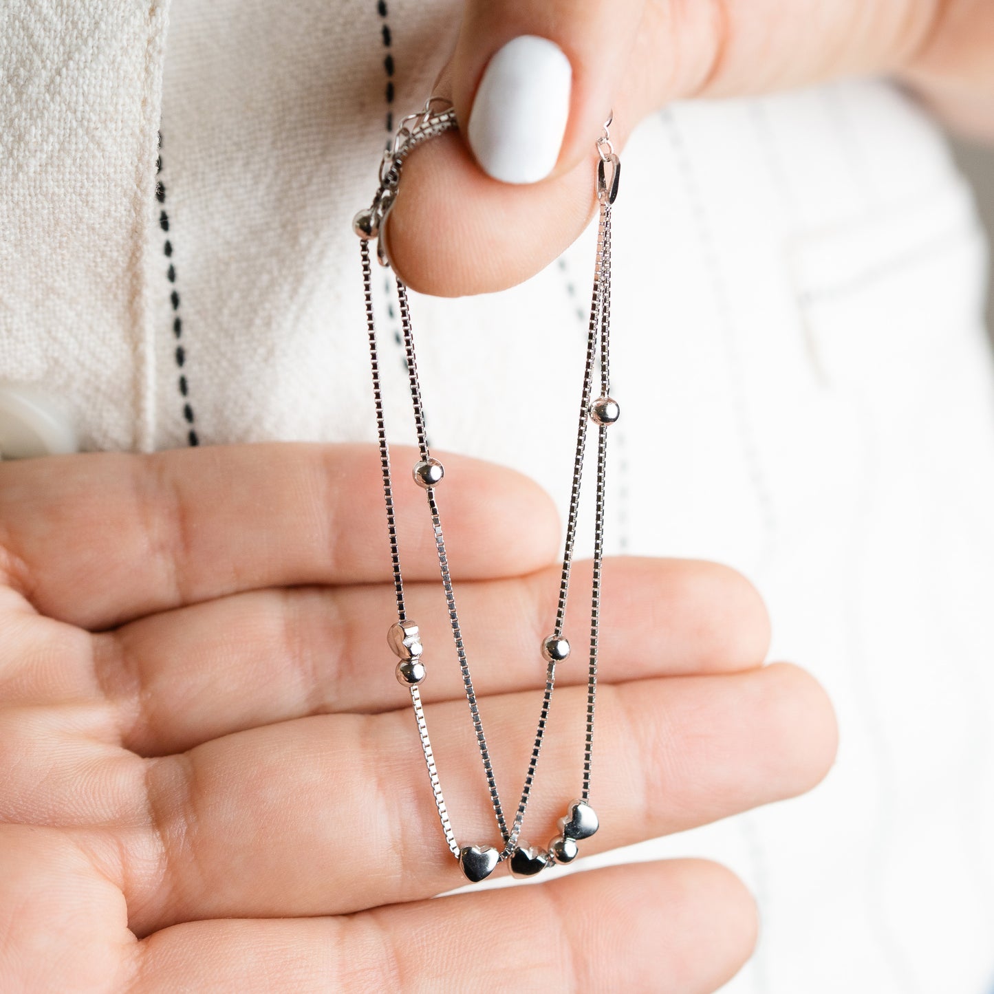 Pulsera doble corazones mini