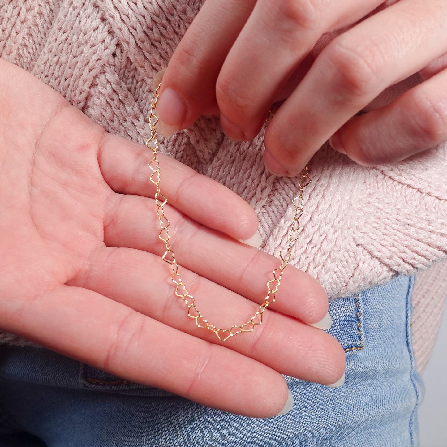 Pulsera corazones entrelazados bañado en oro