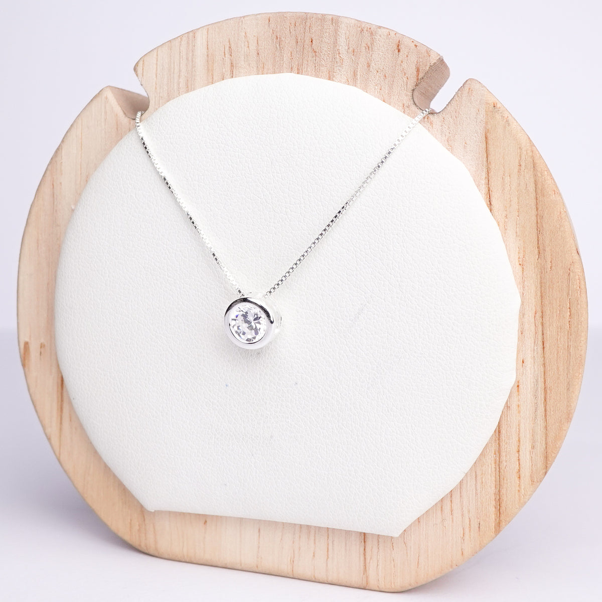 Collar punto de luz circon