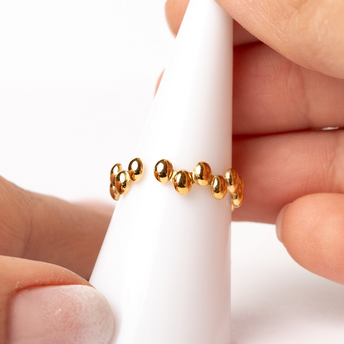 Anillo ajustable óvalos bañado en oro