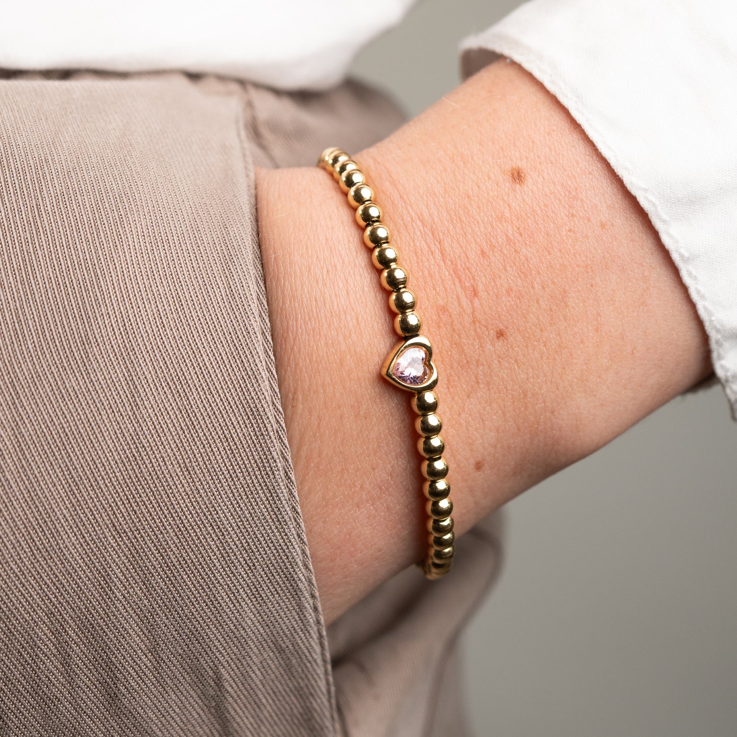 Pulsera corazón circón rosa bañado en oro