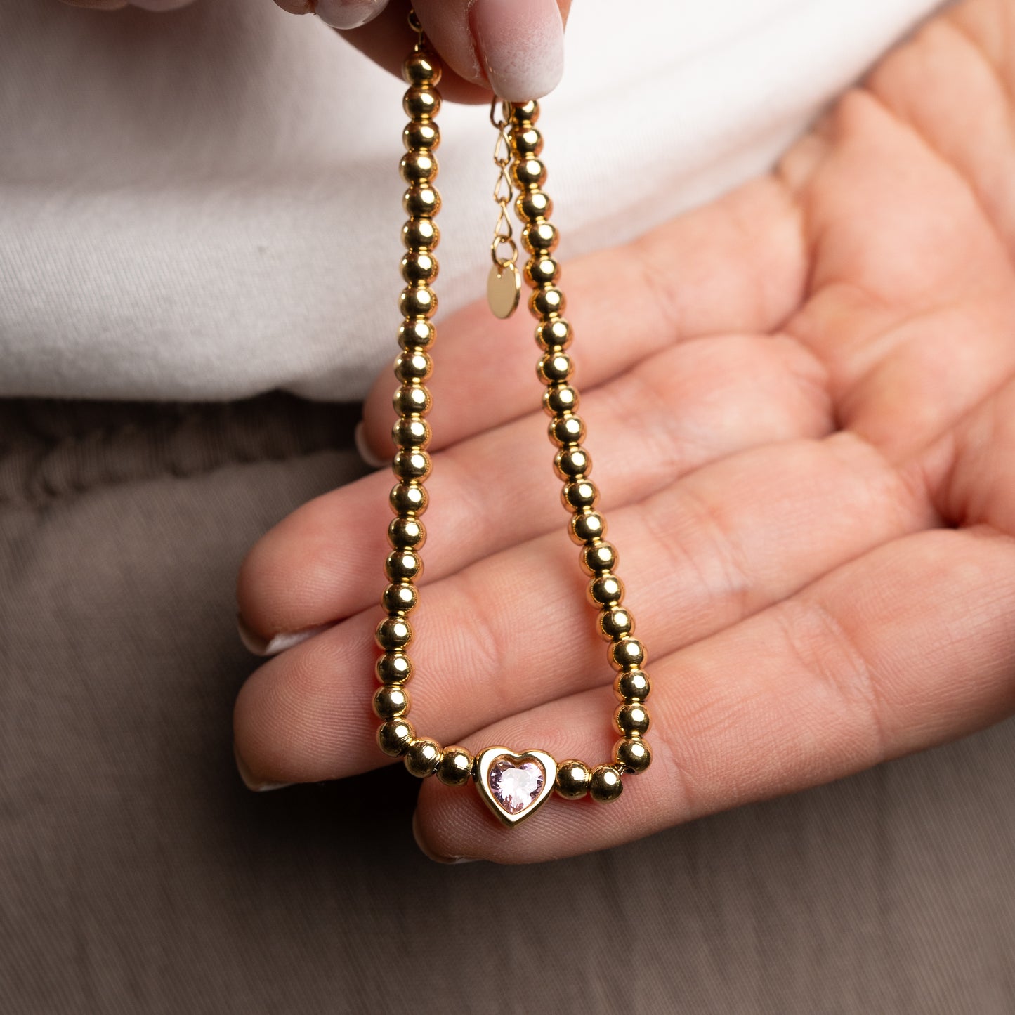 Pulsera corazón circón rosa bañado en oro
