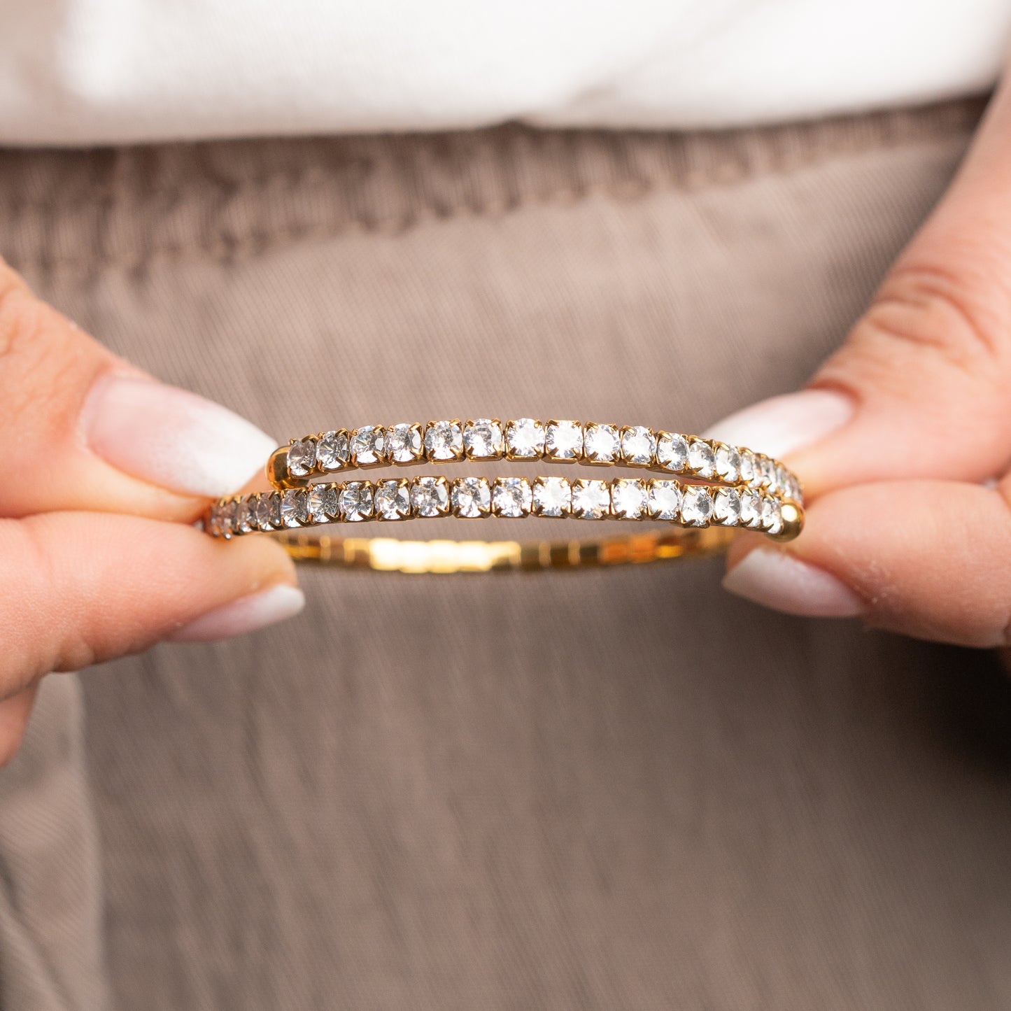 Pulsera cruzada circones bañado en oro