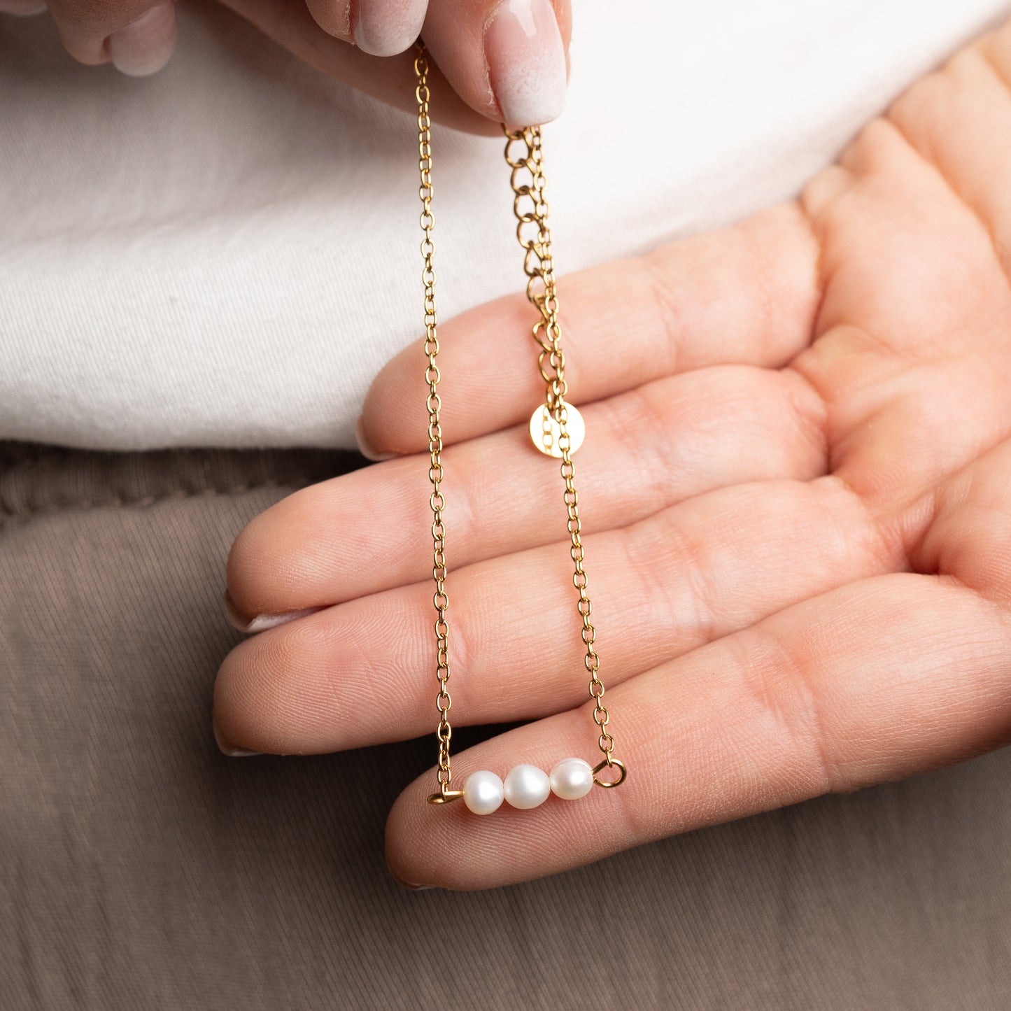 Tobillera perlas bañado en oro