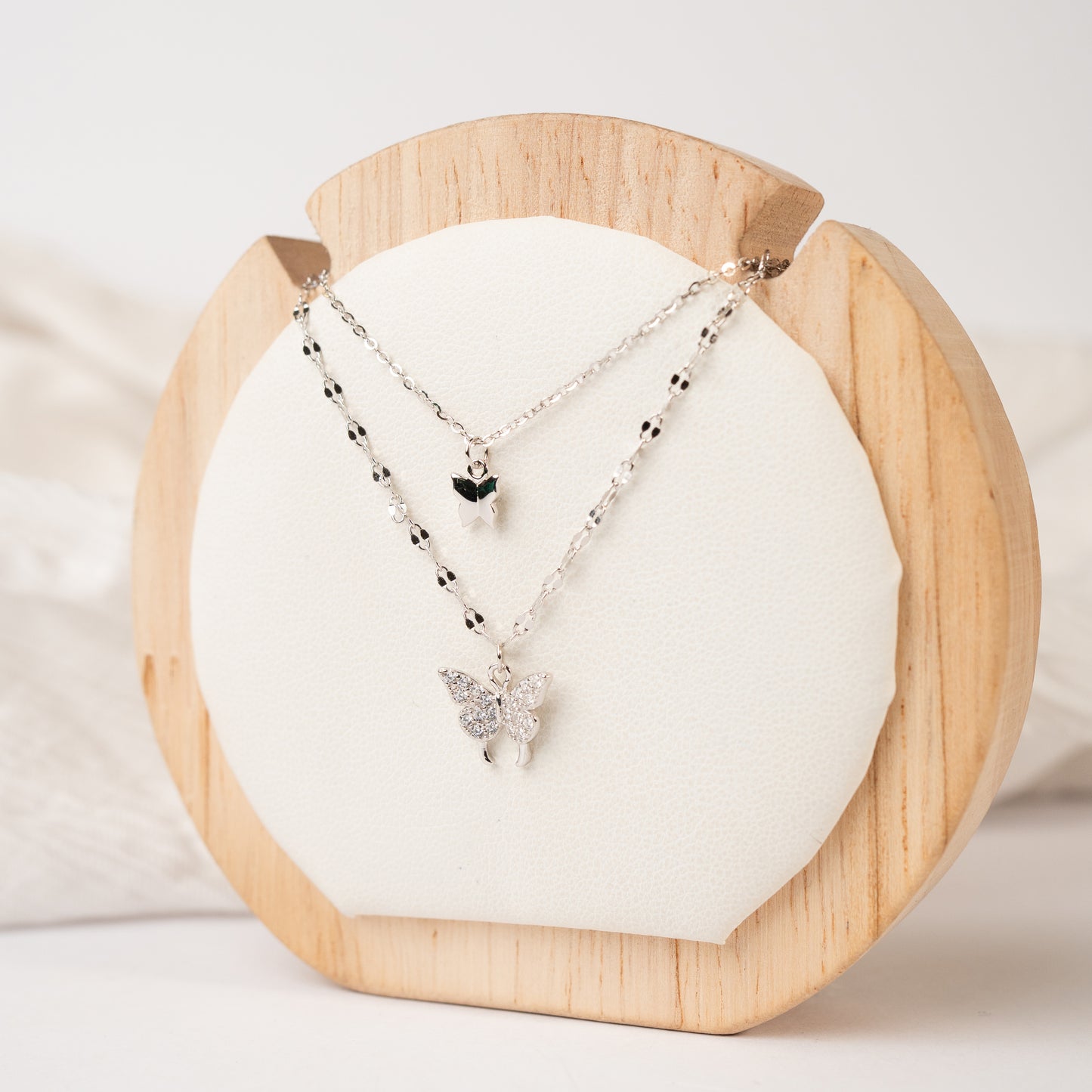 Collar doble mariposas