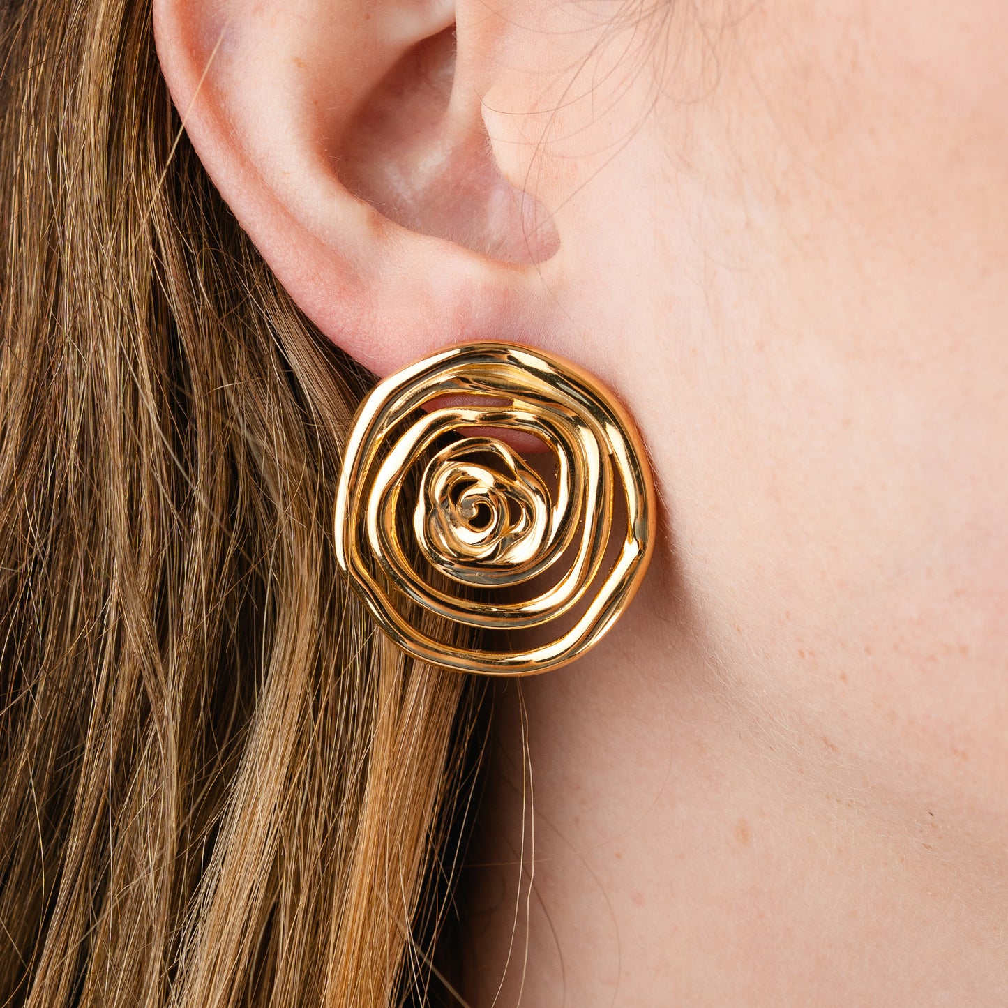 Aros pegados espiral bañados en oro