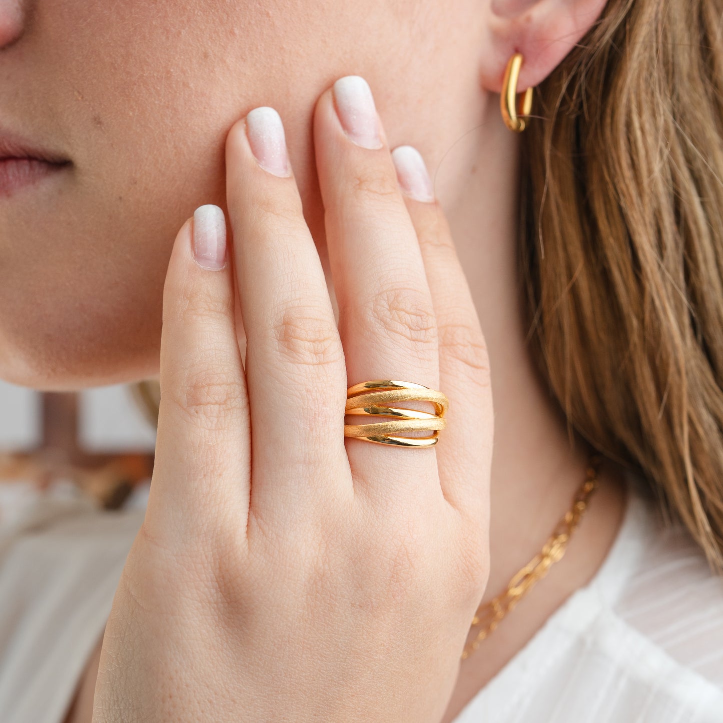 Anillo ajustable trenza bañado en oro