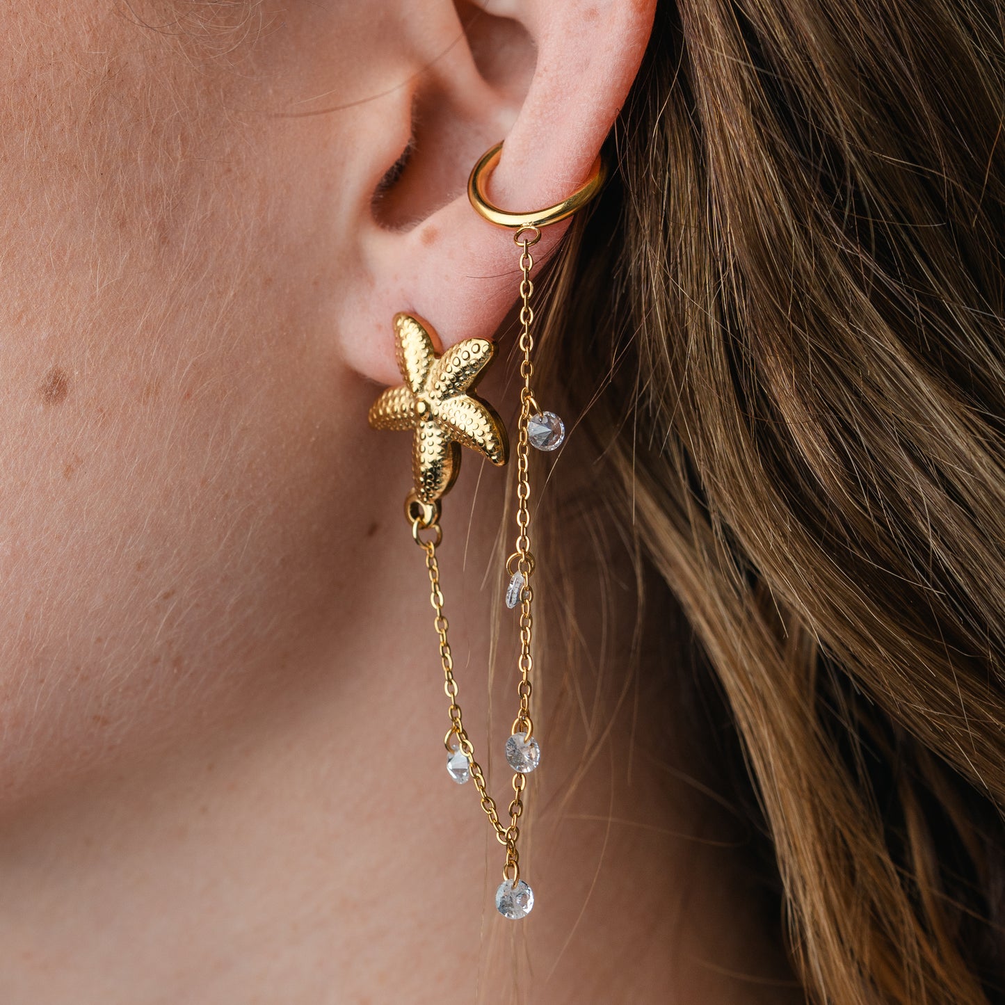 Aro ear cuff estrella de mar cadena bañado en oro