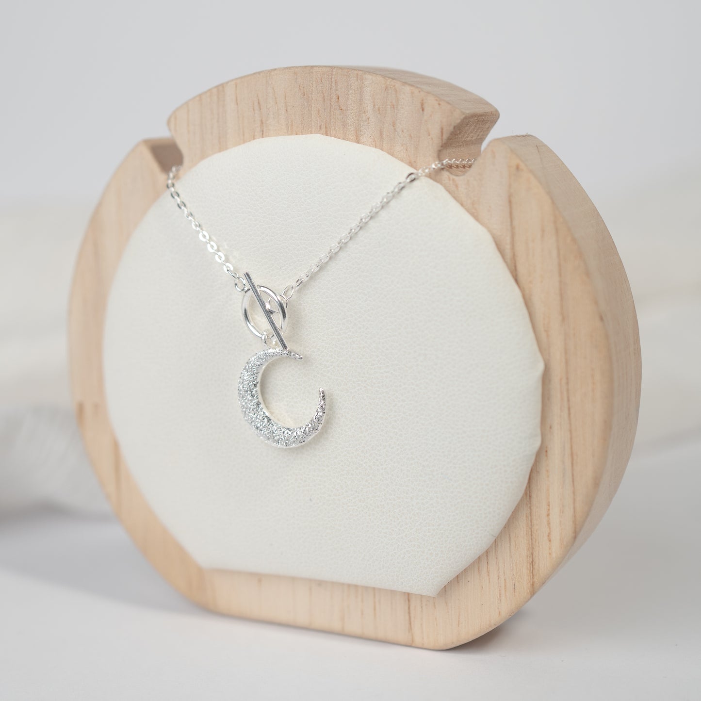 Collar timón media luna circones