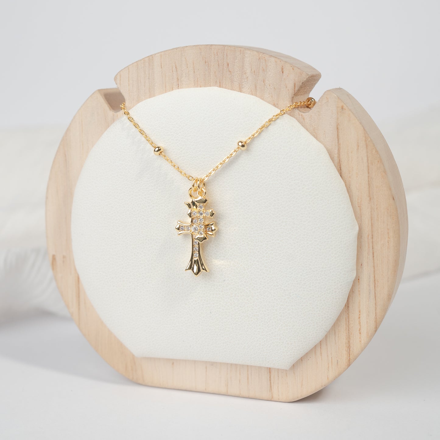 Collar dos cruces bañado en oro