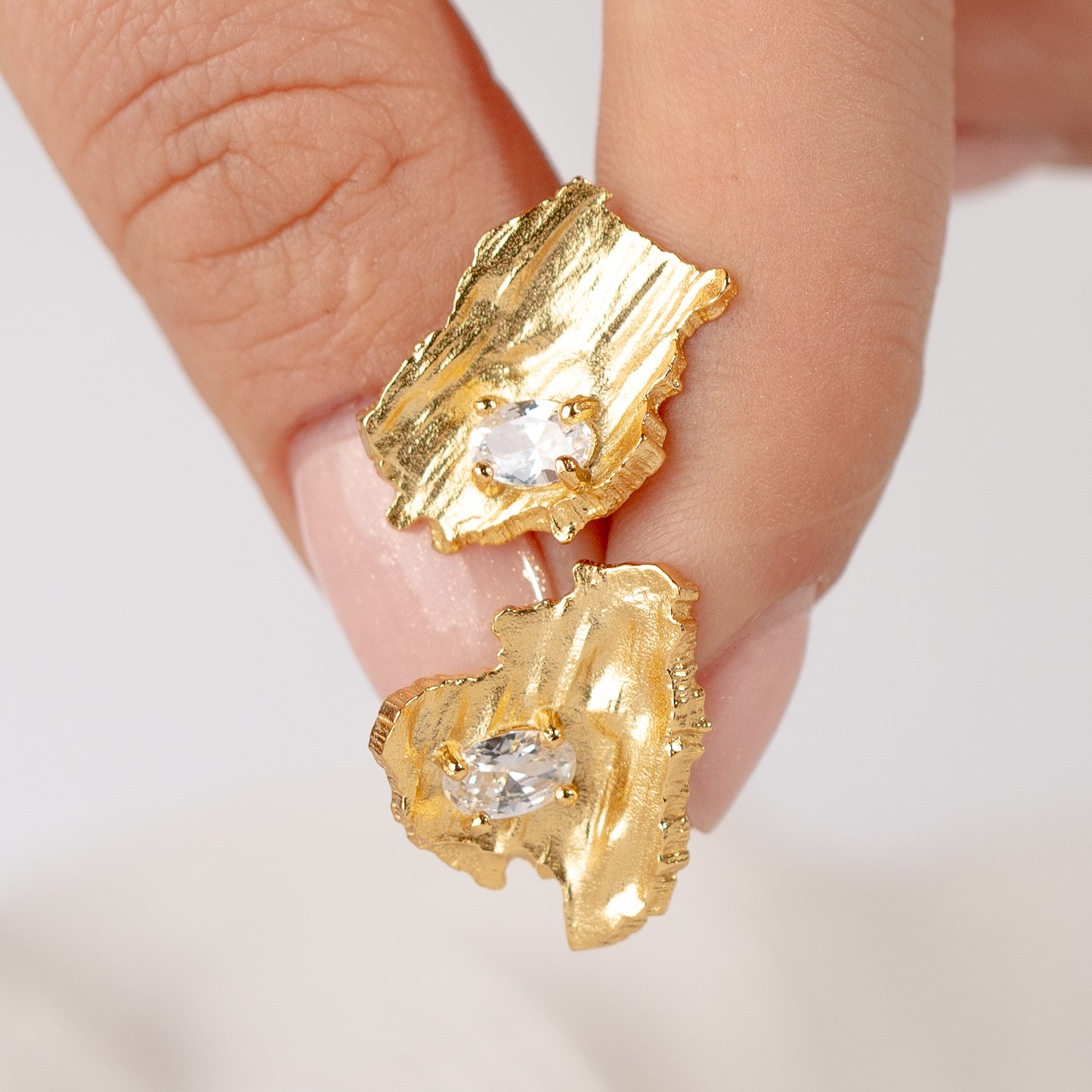 Aros pegados irregulares circón bañado en oro