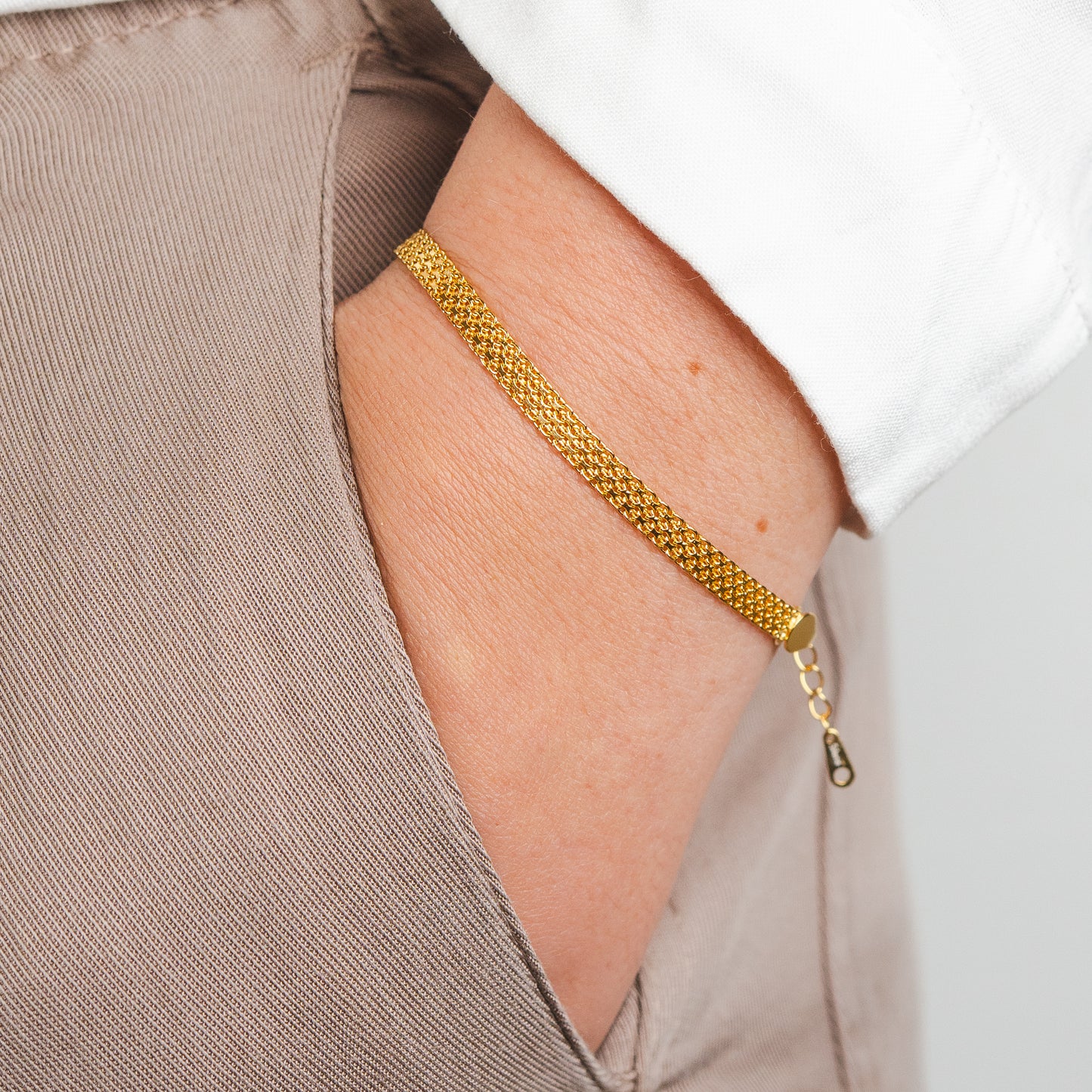 Pulsera diseño tejido bañado en oro
