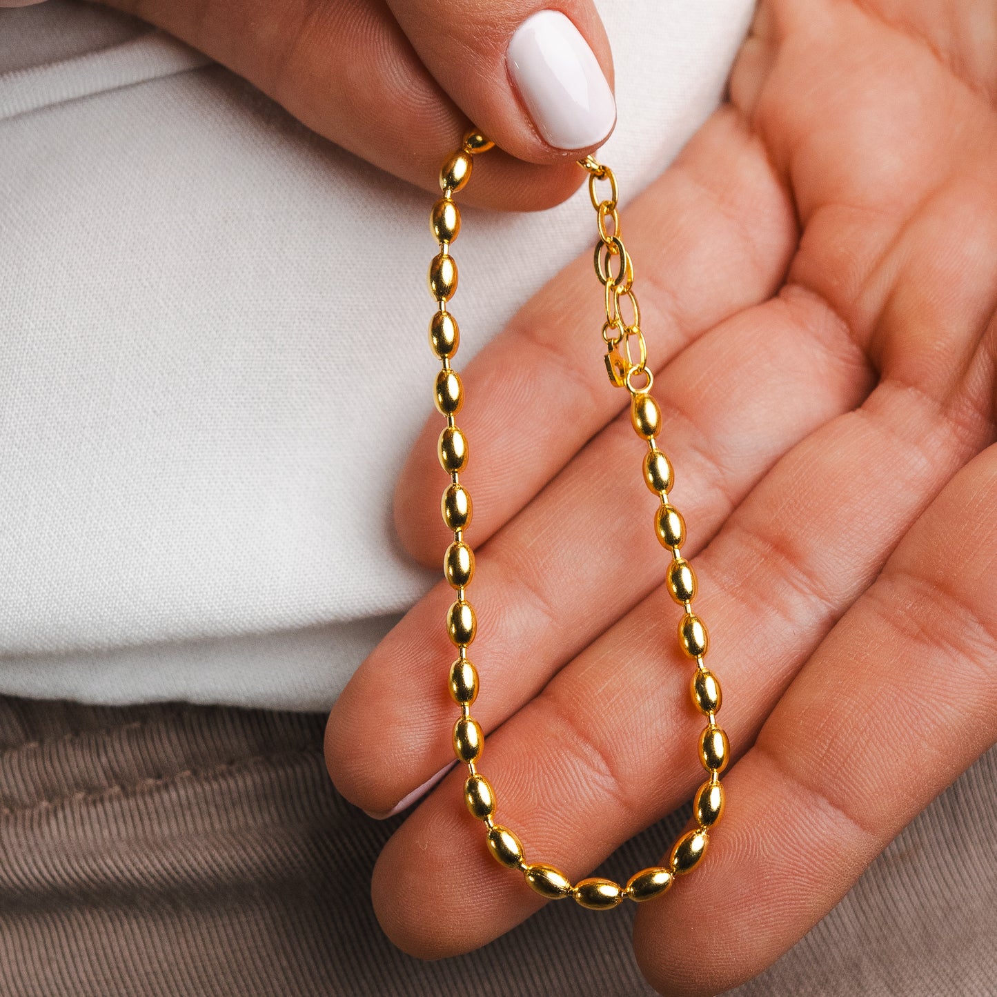 Pulsera mostacillas ovaladas bañado en oro