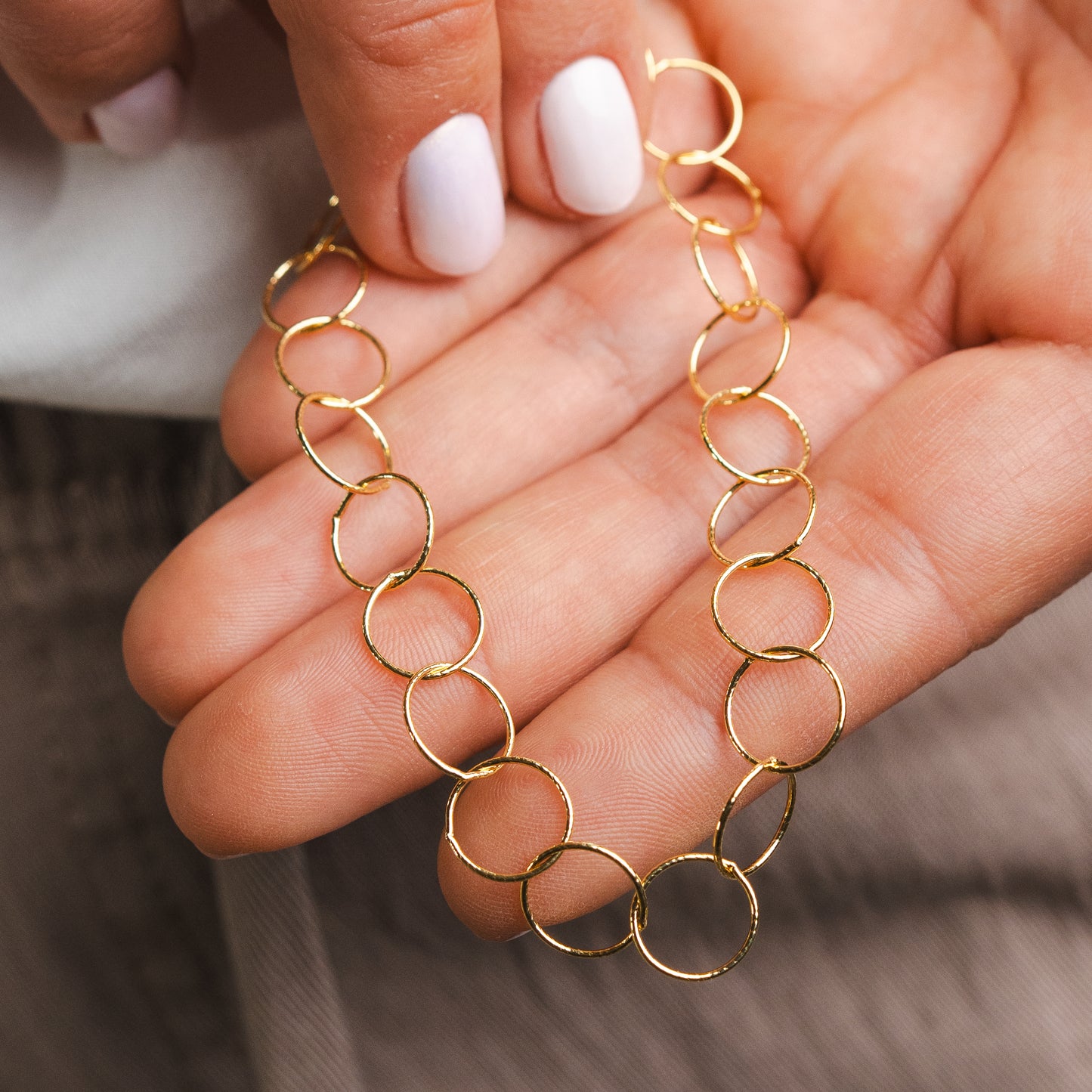 Pulsera círculos entrelazados bañado en oro