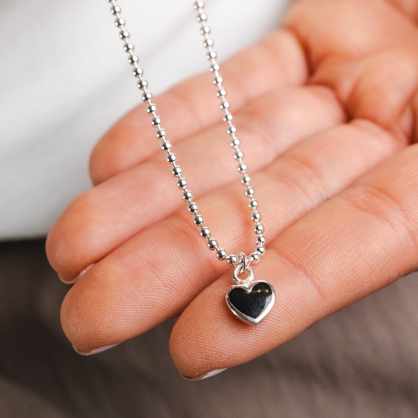 Pulsera mostacillas corazón negro