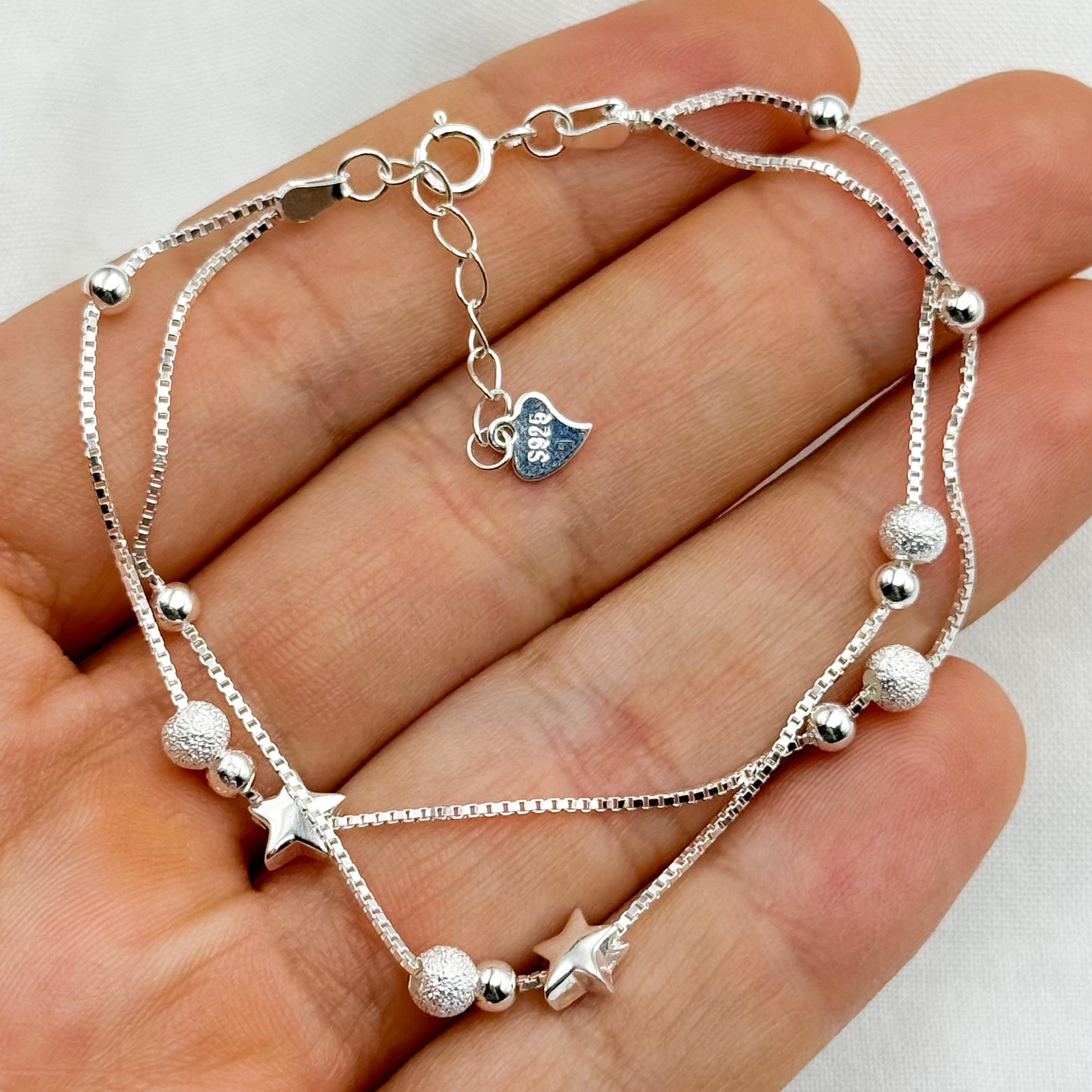 Pulsera doble estrellas