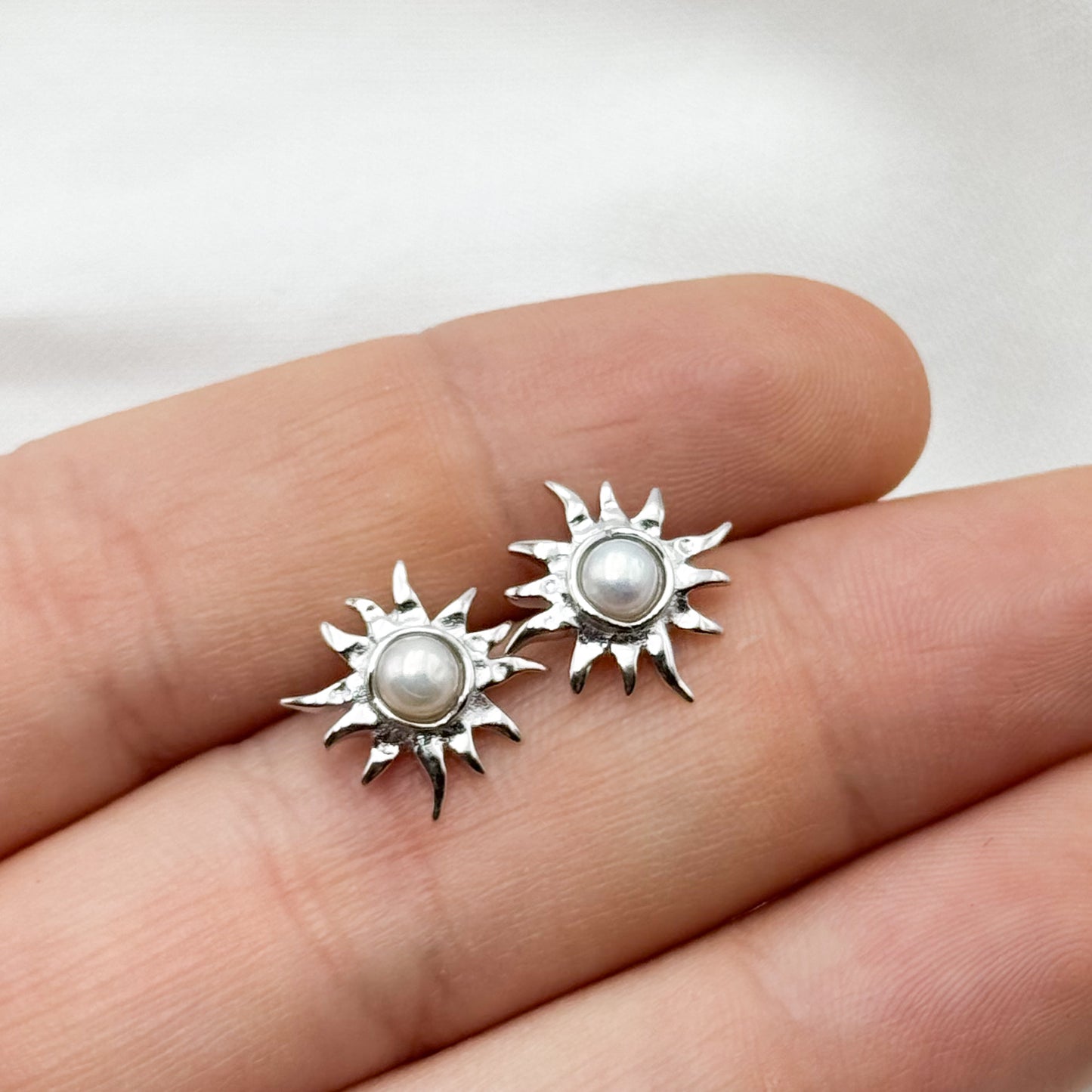 Aros pegados de sol perla