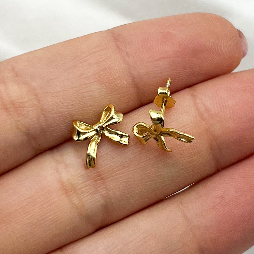 Aros pegados lazo bañado en oro