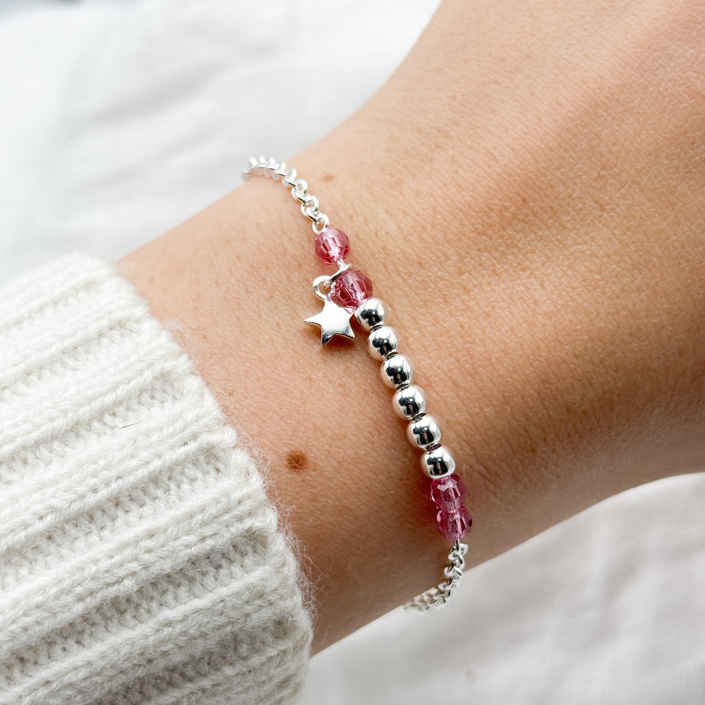 Pulsera mostacillas rosa y estrella