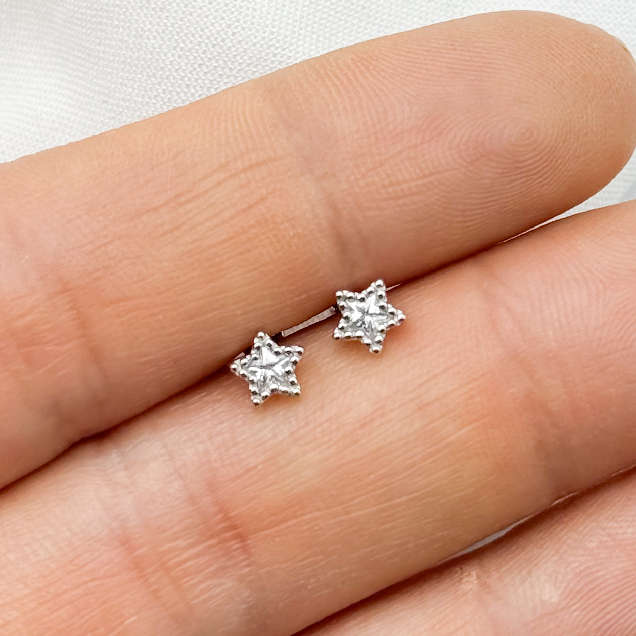 Aros pegados estrella circón cierre pelotita