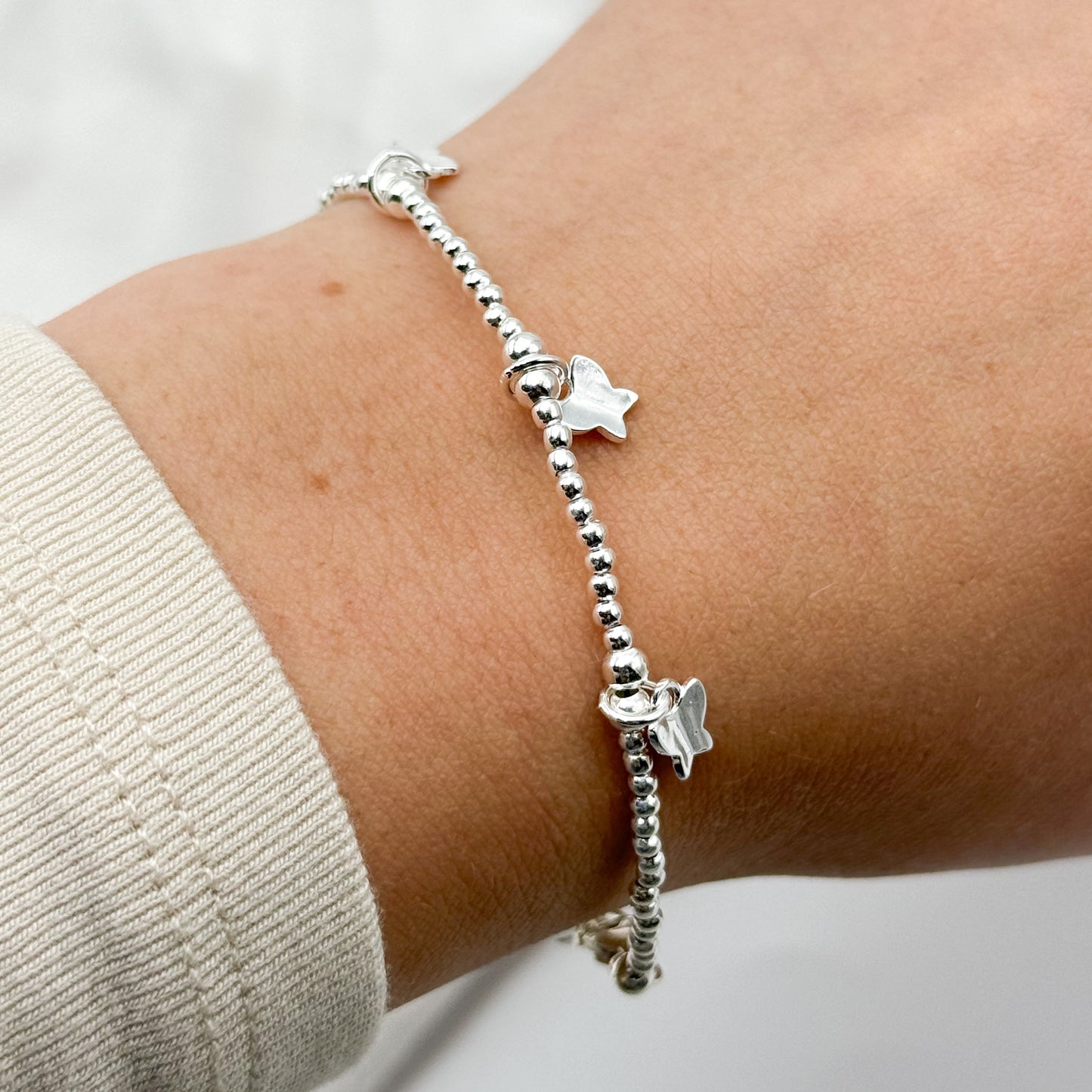 Pulsera mostacillas y mariposas