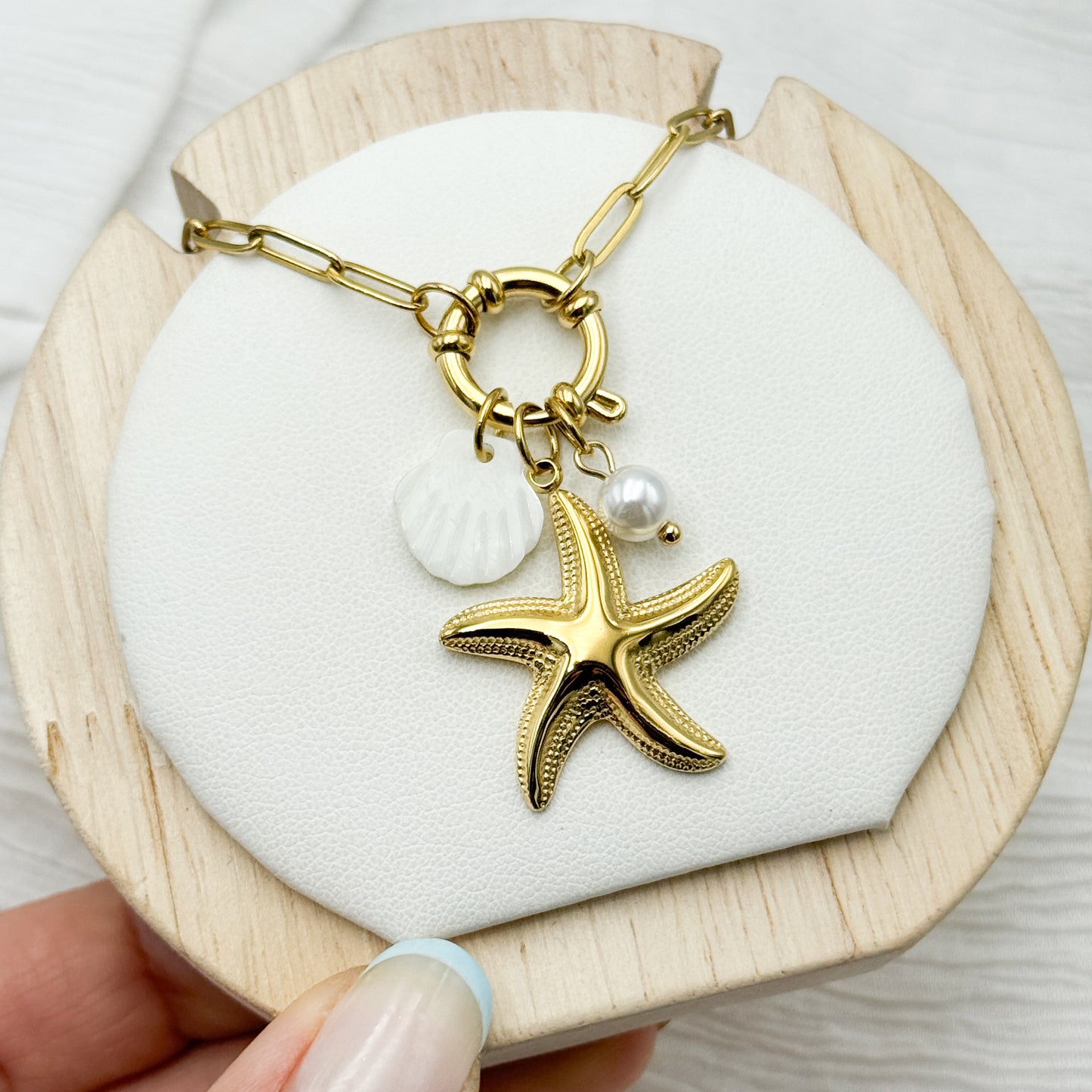 Collar timón estrella de mar bañado en oro