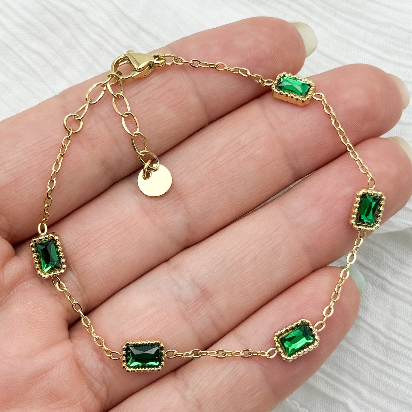 Pulseras circones verdes bañado en oro