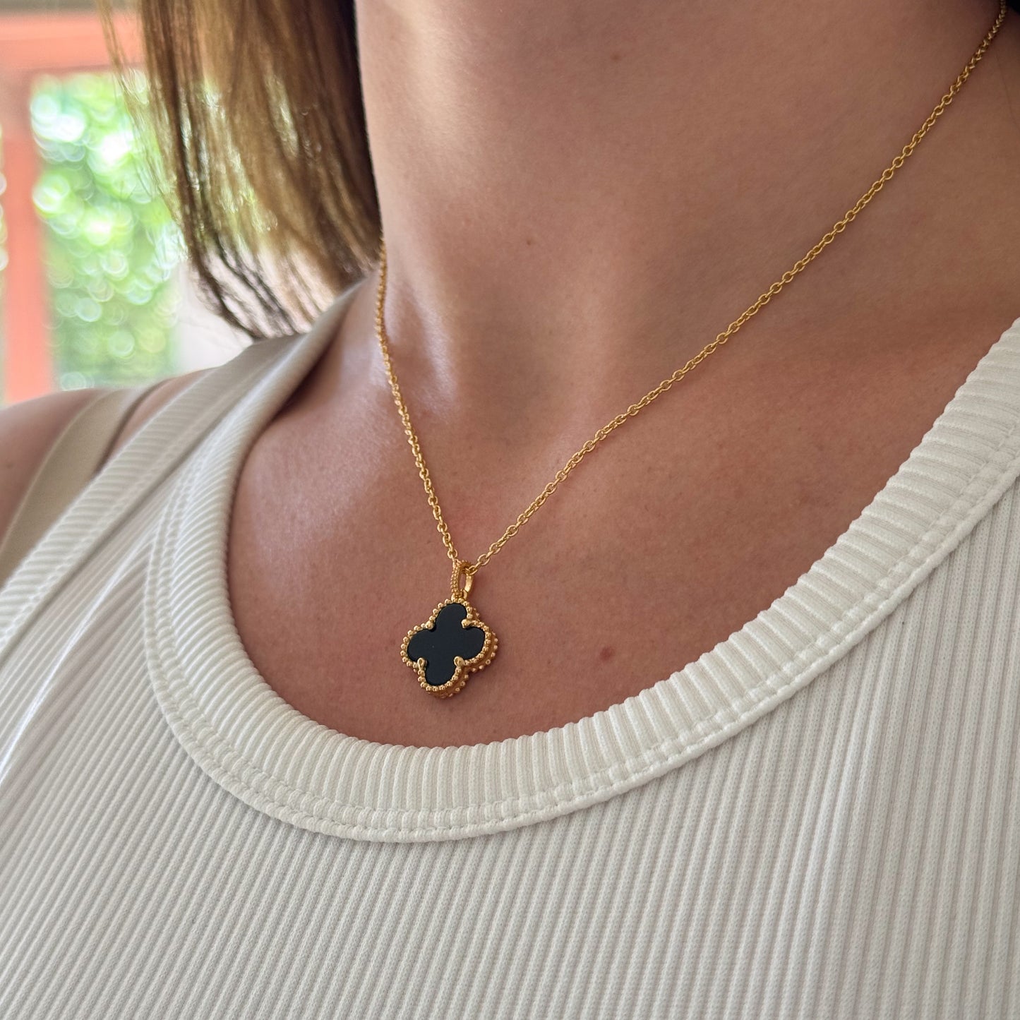 Collar trébol negro bañado en oro