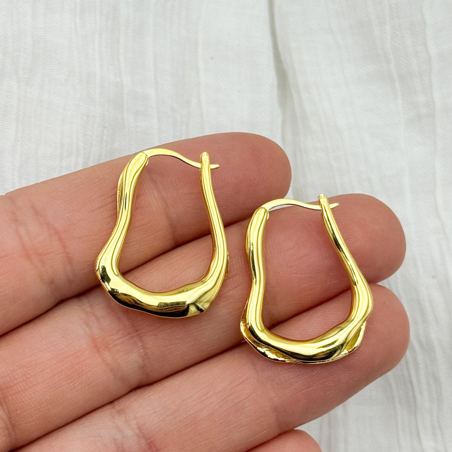 Aros argolla diseño bote bañado en oro