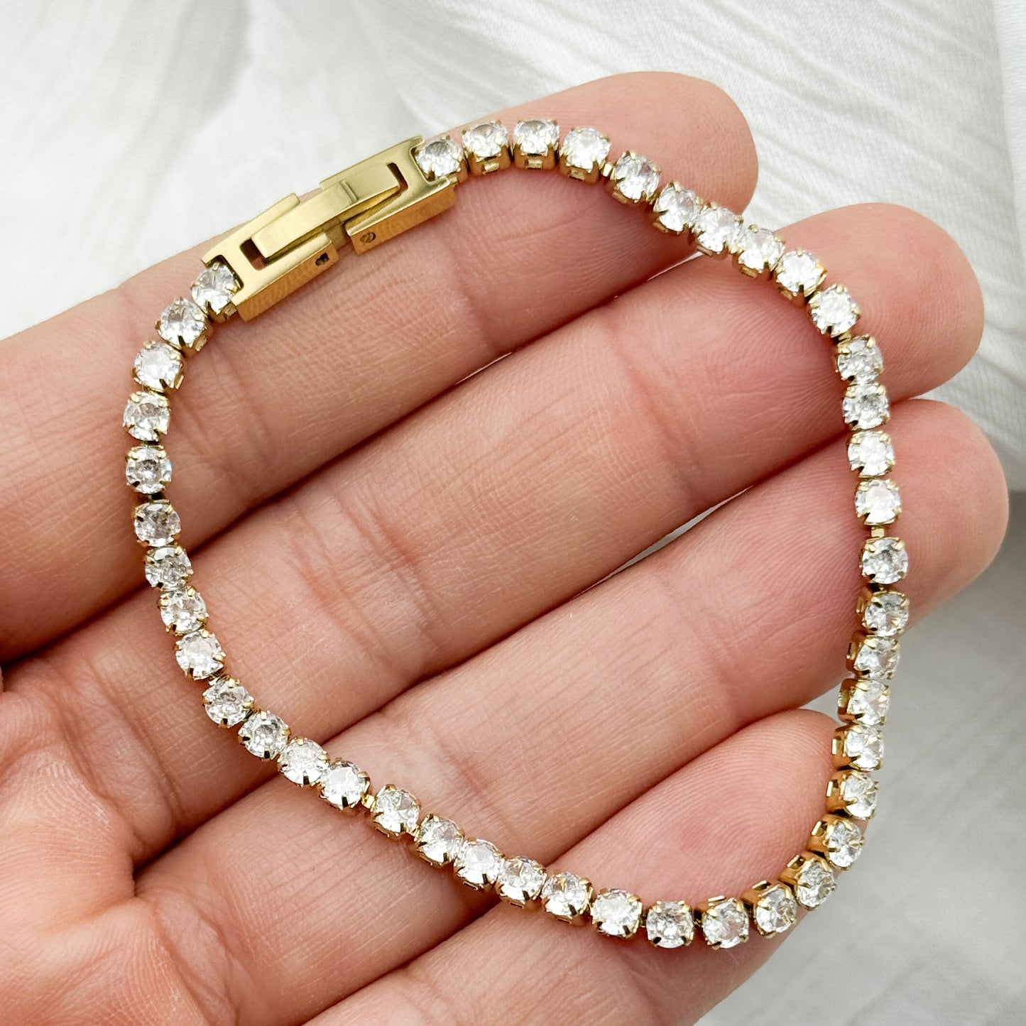 Pulseras circones bañado en oro