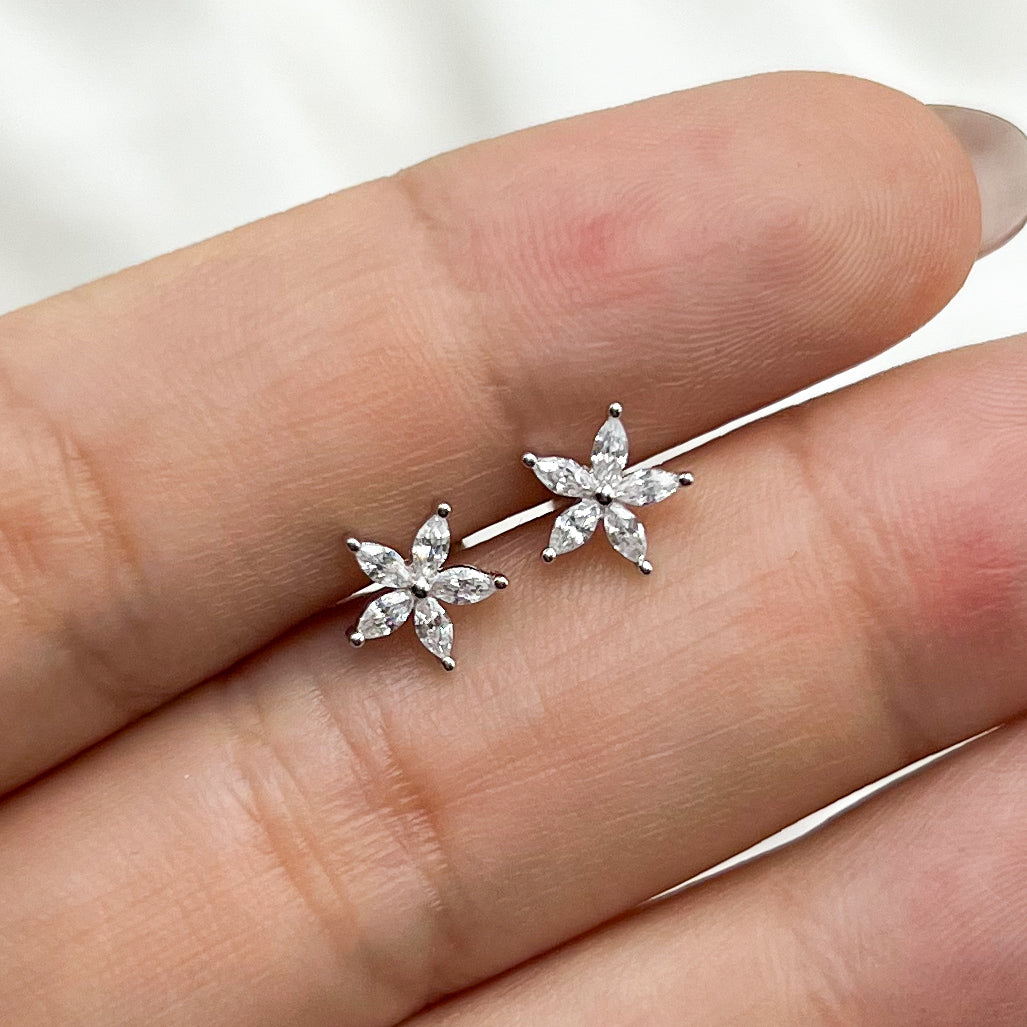 Aros pegados flor cierre pelotita