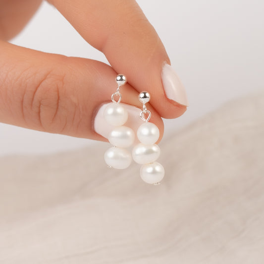 Aros pegados perlas colgantes