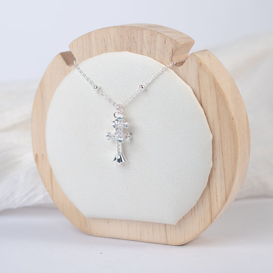 Collar dos cruces circones