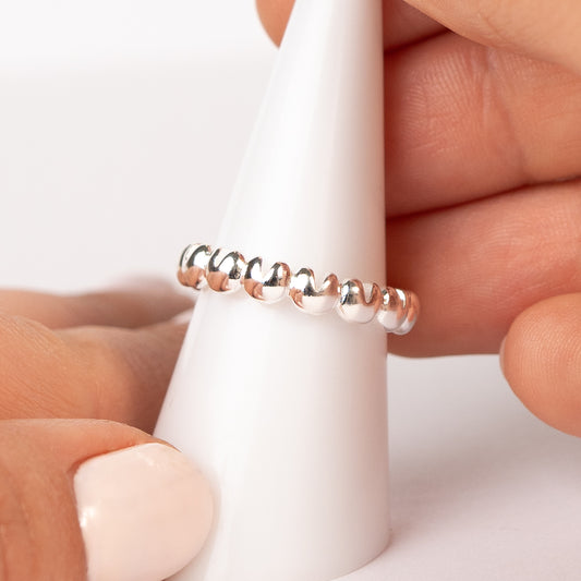 Anillo ajustable corazones entrelazados