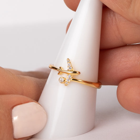 Anillo ajustable avión bañado en oro