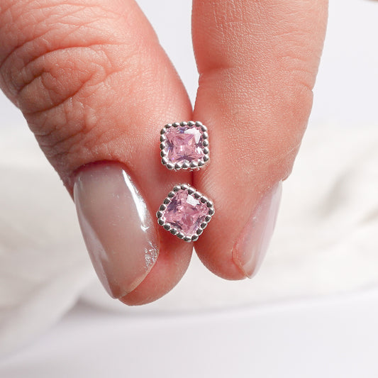 Aros pegados pink cierre pelotita