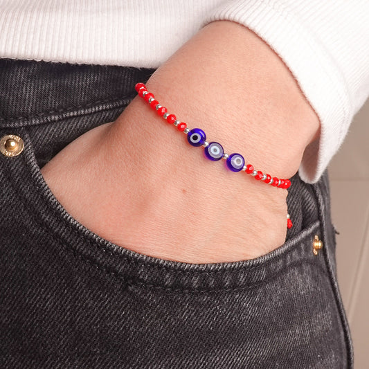 Pulsera mostacillas rojas ojos turcos