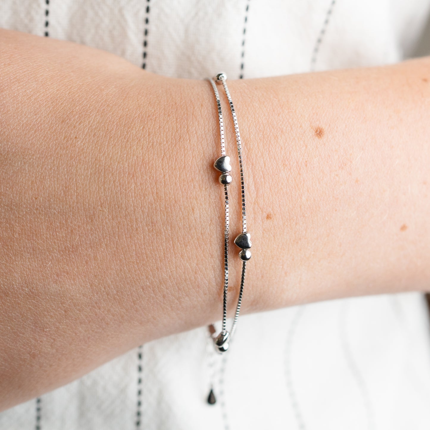 Pulsera doble corazones mini