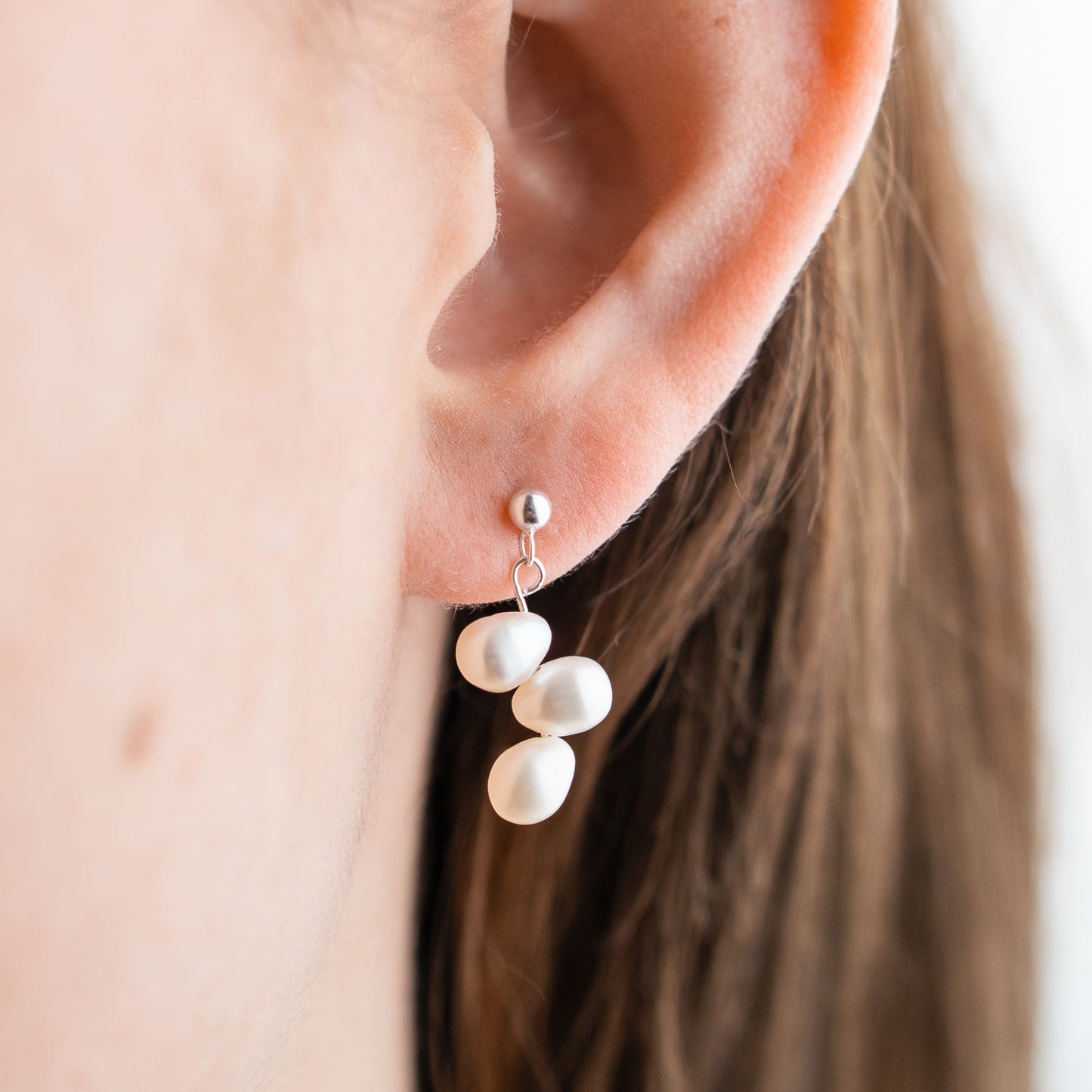 Aros pegados perlas colgantes