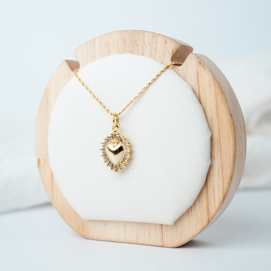 Collar corazón detente