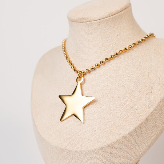 Collar estrella bañado en oro