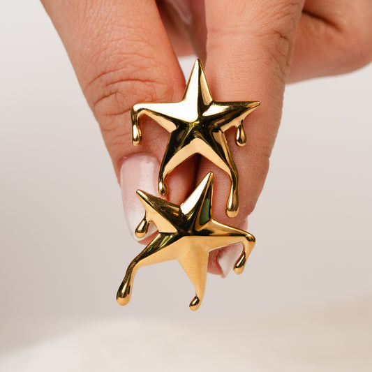 Aros pegados estrellas doradas