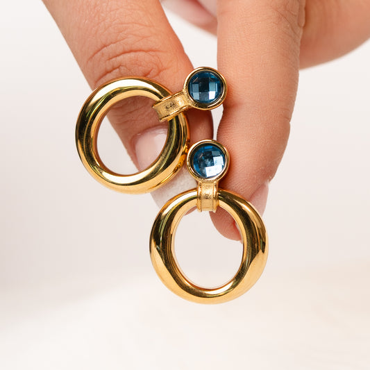 Aros colgantes circón azul bañado en oro