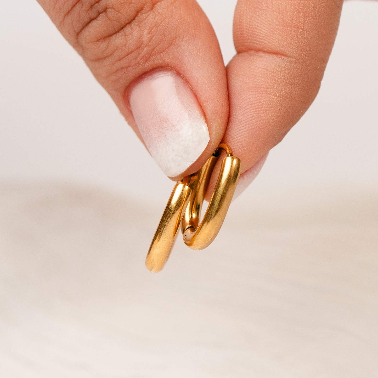 Aros argolla huggie mini gold oval