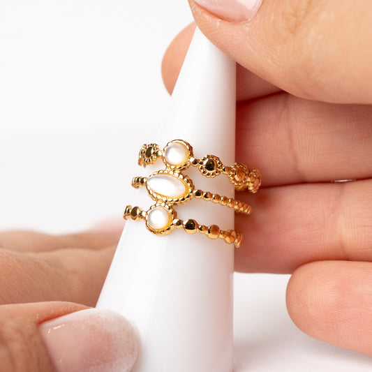 Anillo ajustable tres lineas diseño blanco bañado en oro