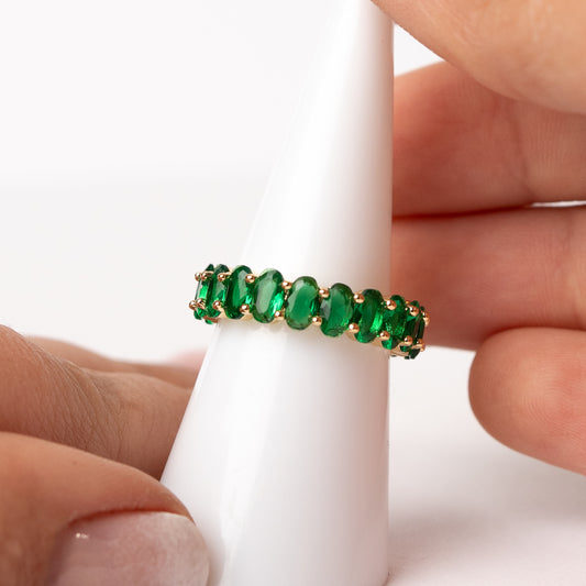 Anillo ajustable circones verdes bañado en oro