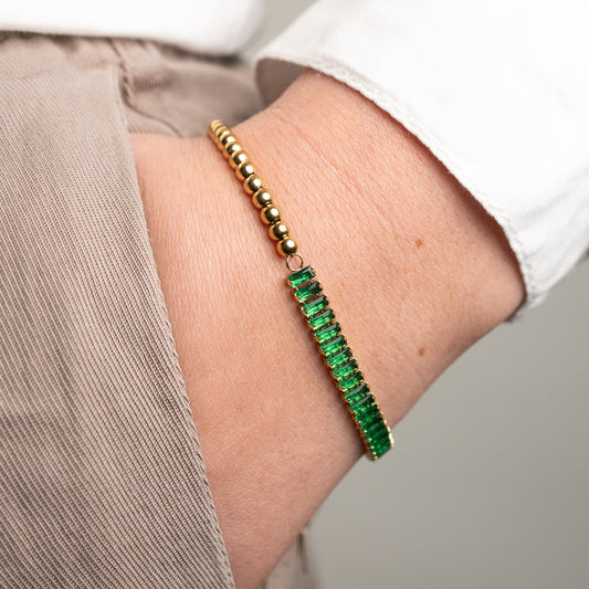Pulsera ajustable diseño circones rectangulares verdes y esferas bañada en oro